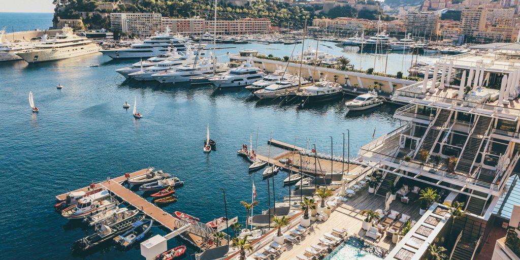 aerial photography of docks with yachts and motorboats during daytime
