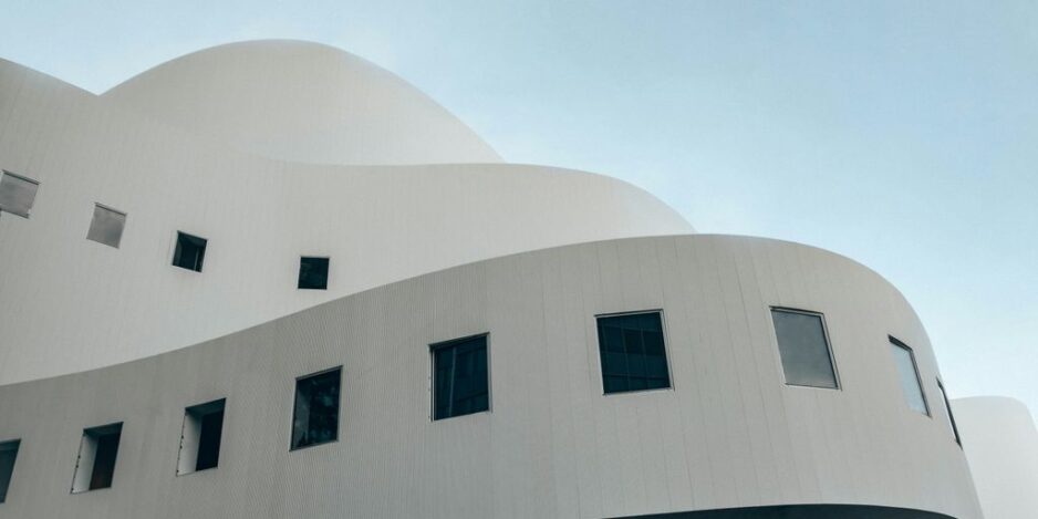 white concrete building under blue sky during daytime