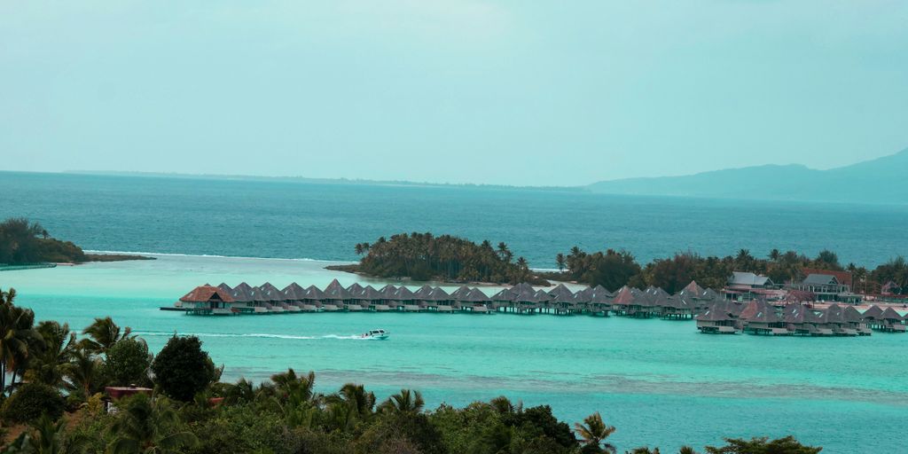 a view of a tropical island from a distance